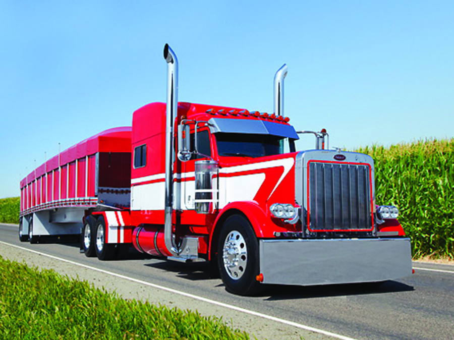 red semi truck with visible radiator